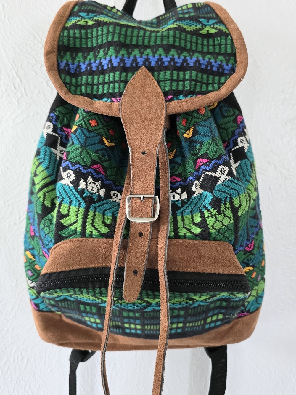 Lightweight woven backpack, vibrant multicolor patterns, faux leather